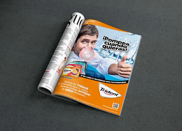 La gráfica de Trident maquetada en una revista abierta.